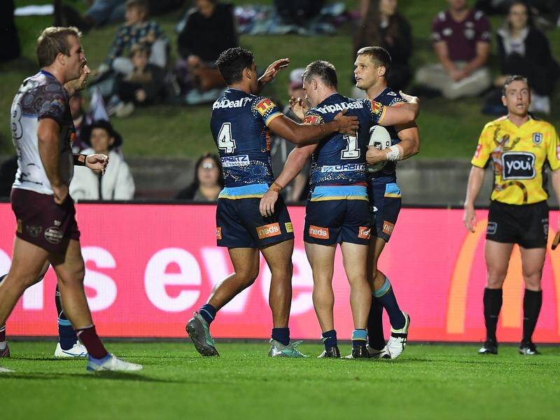 The Gold Coast Titans have recovered from a slow start to thrash Manly 36-18 in Sydney.