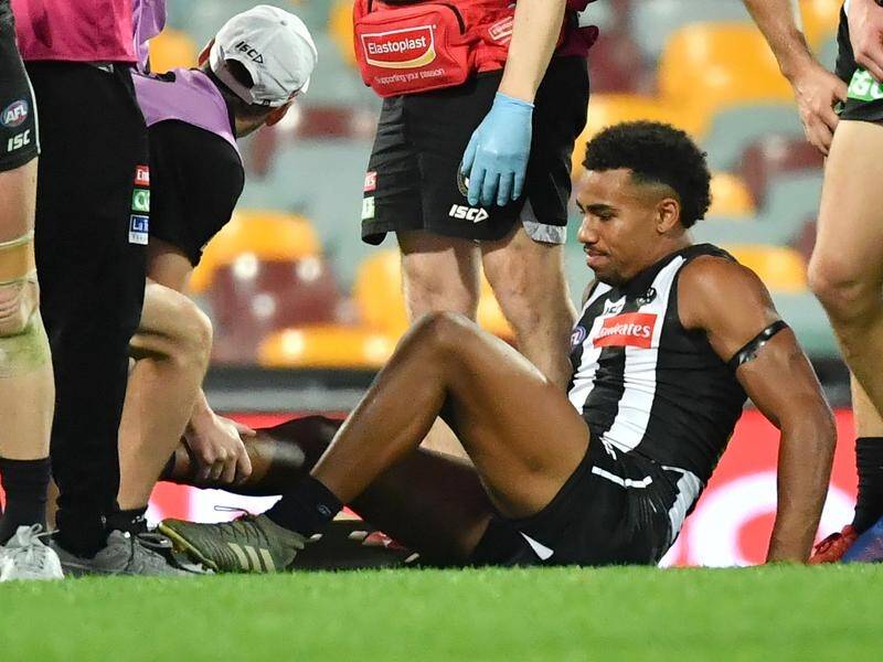 Isaac Quaynor suffered a gashed leg in Colingwood's AFL win over Sydney in Brisbane.