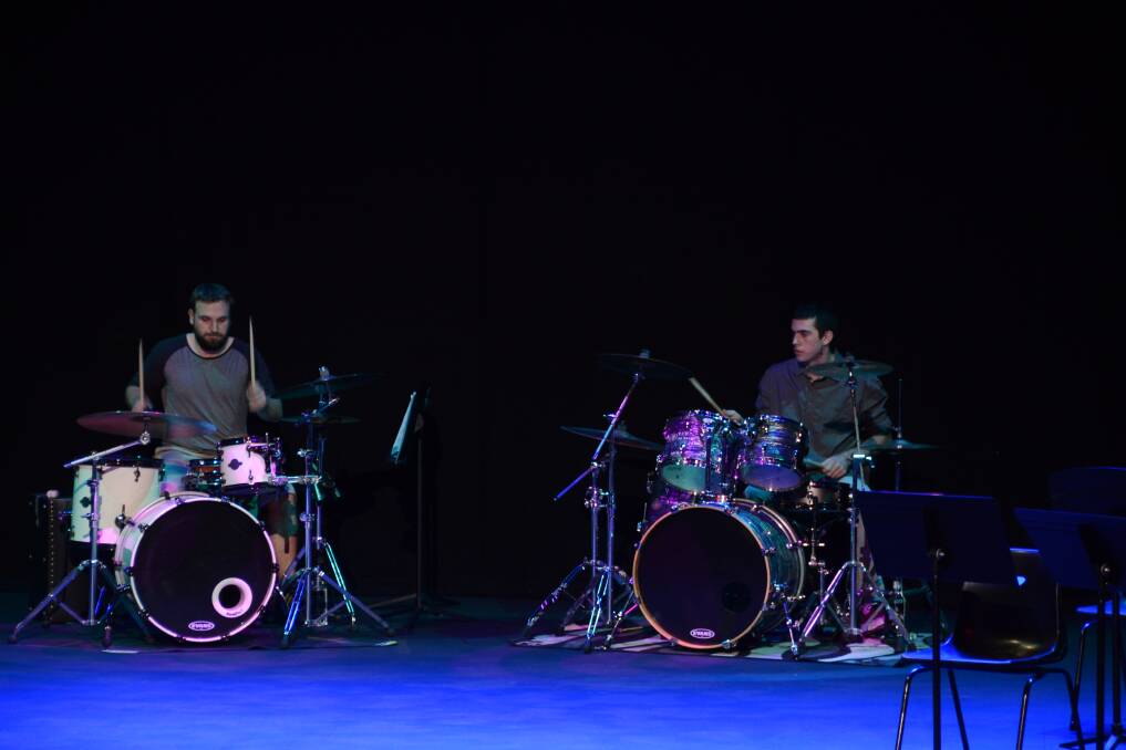 Jarrad Walton and Phil Ridley perform a drum duet.