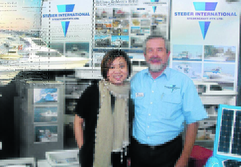 Co-founder of The Media Shop Group, Jessica Toh meeting with managing director of Steber International, Alan Steber, at the Sydney Boat Show.