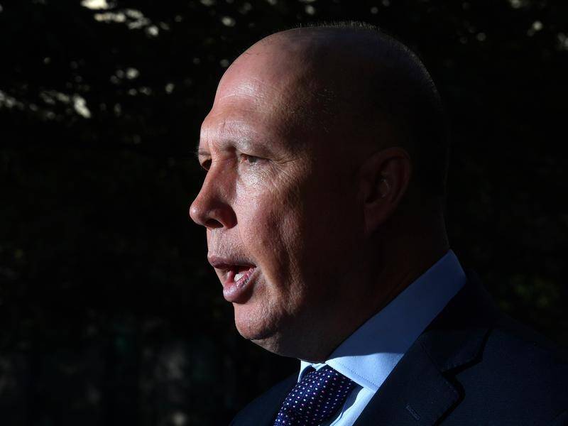 Home Affairs minister Peter Dutton has been quizzed about right-wing extremists in Australia.