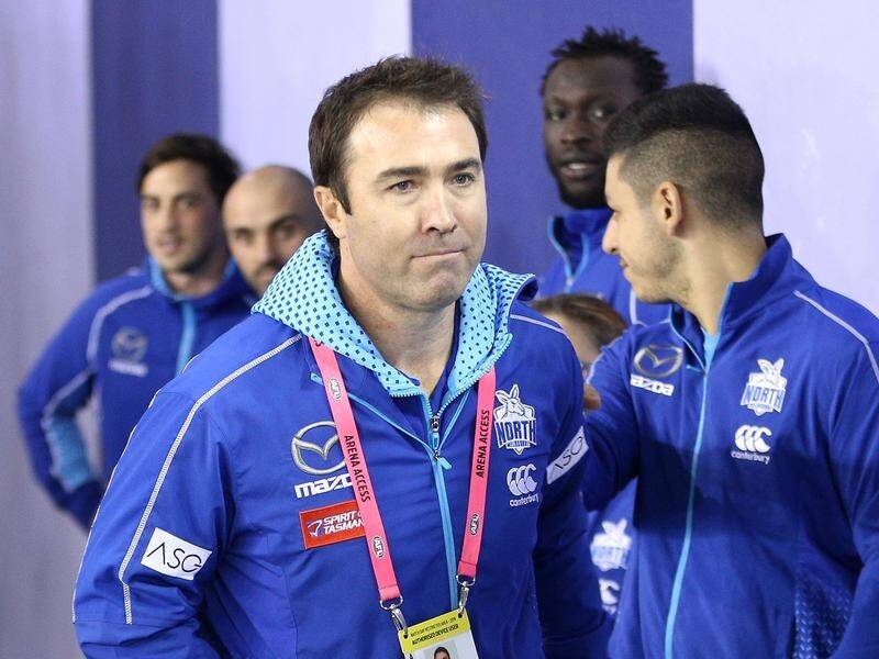 Kangaroos coach Brad Scott has hit out at critic and former North Melbourne champion David King.