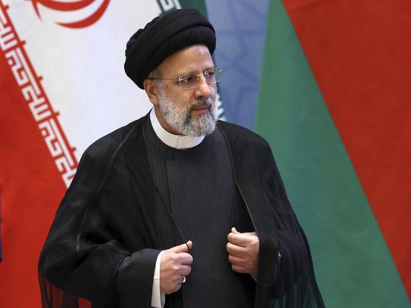 Iran's President Ebrahim Raisi has ordered a probe into a 22-year-old woman's death in custody. (AP PHOTO)