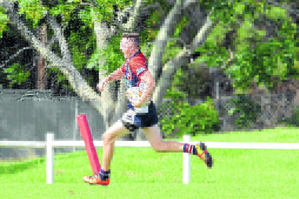 Old Bar fullback Daniel Morris races away for the try that sealed the win over Forster-Tuncurry in the opening pre-season round.