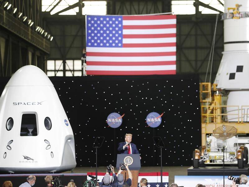 Donald Trump has spoken at the Florida launch of a rocket to the ISS.