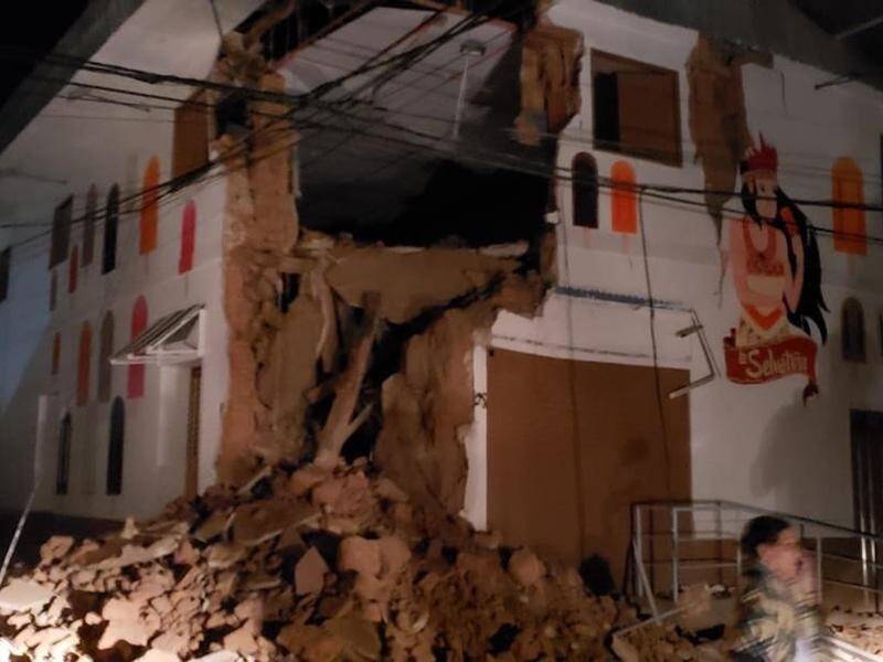 One person has died, 11 are hurt and more than 50 homes destroyed by a huge quake in northern Peru.