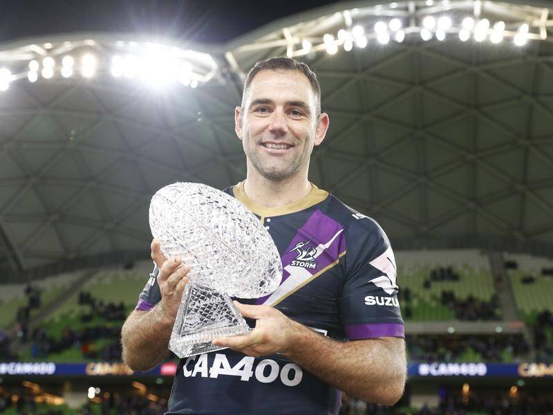 Cameron Smith has brought up his 400th NRL game in style in Melbourne's 40-16 win over Cronulla.