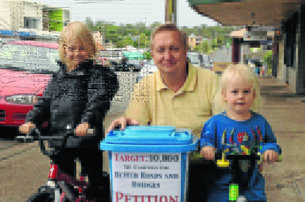 Seeking fairness and equality: Future road users, Felix and Odis King-Schmidt with Greater Taree City councillor Peter Epov.