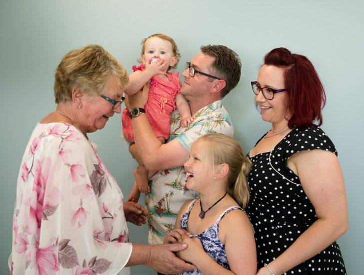 Eunice Lee, with her son, Mark Lee, who has successfully completed a gene therapy trial for haemophilia, and her granddaughters, Grace, 10, and Violet ,18 months, and her daughter in law, Shannon Salo, at the Charles Perkins Centre at RPA in Sydney. Eunice lost two other sons to haemophilia. 7th December 2017 Photo: Janie Barrett