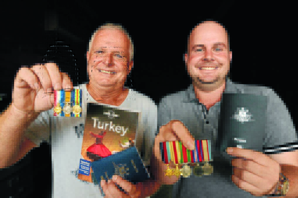 Gallipoli bound: Terry McCaffrey and son Sam will travel to Turkey for the Anzac centenary service with miniatures of Terry's father's and grandfather's service medals made by Terry's step father Bruce Loftus OAM.