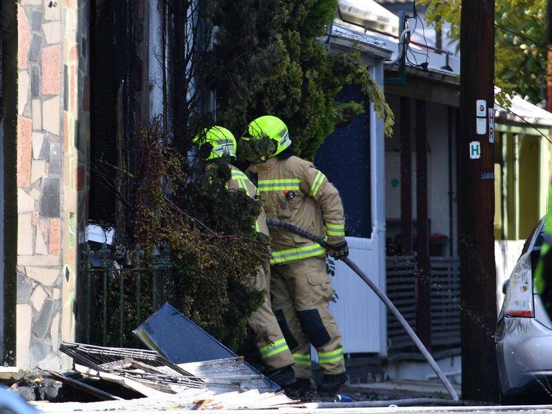 The death toll in a suspicious Sydney boarding house blaze has risen to three.
