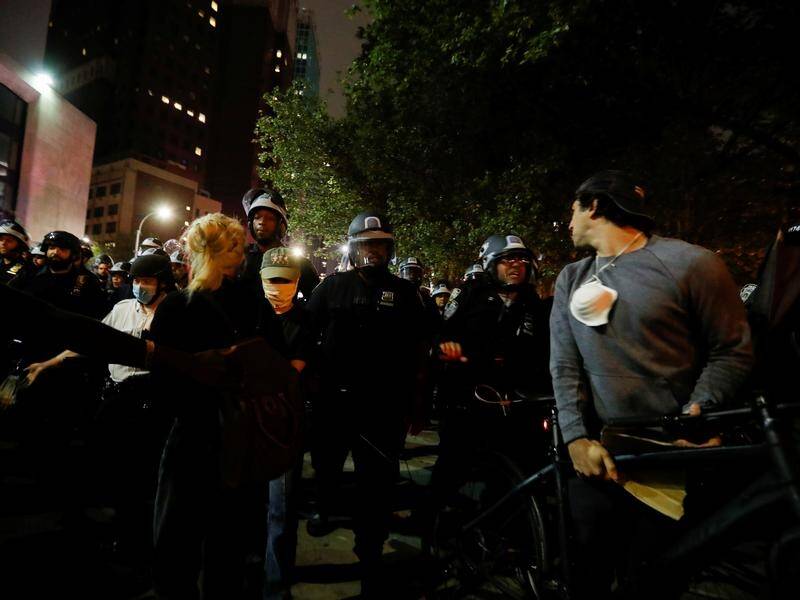 Police confront protesters in the New York City borough of Brooklyn.