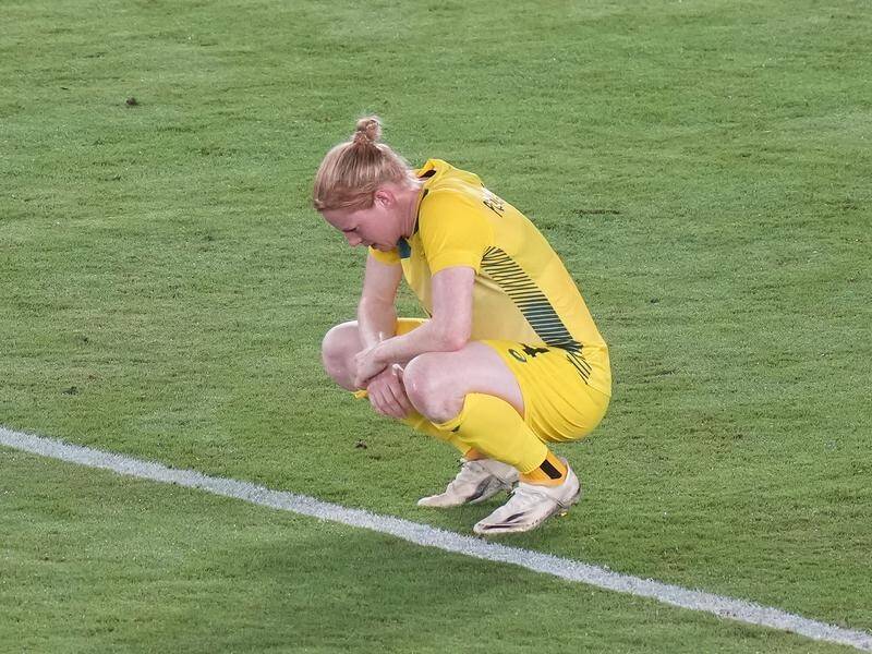 Clare Polkinghorne cuts a dejected figure after the Matildas' semi-final loss to Sweden.