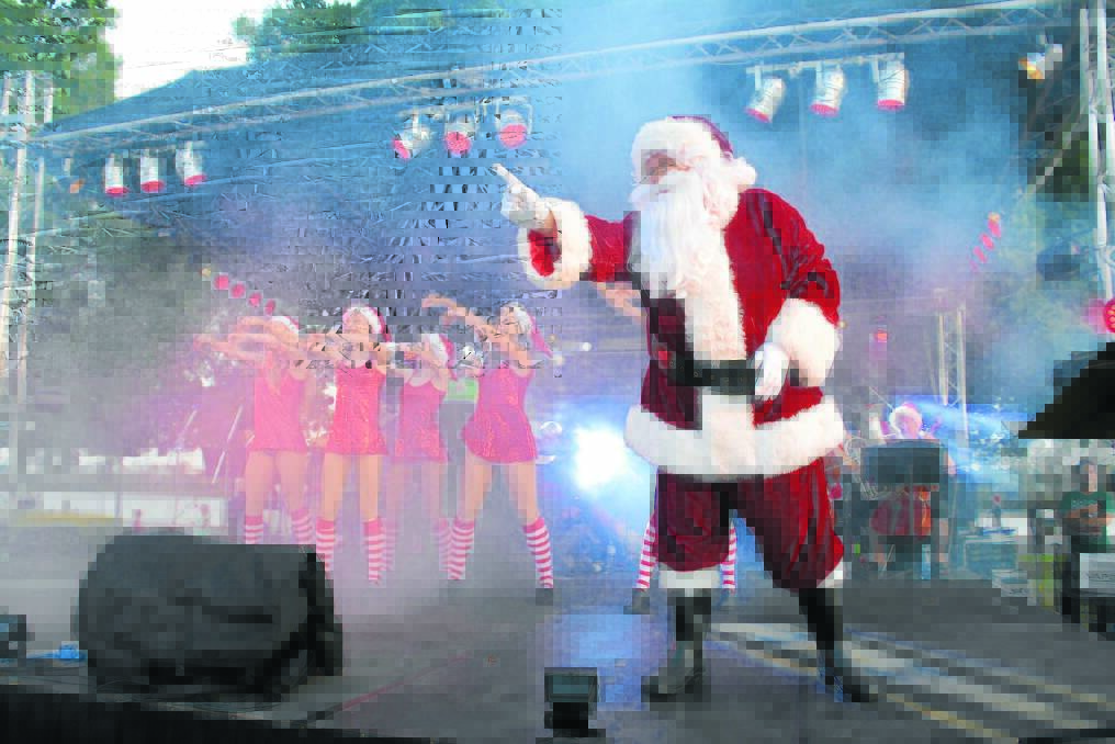 Santa Claus gets his groove on with the dancers from Andrea Rowsell Academy of Dance.