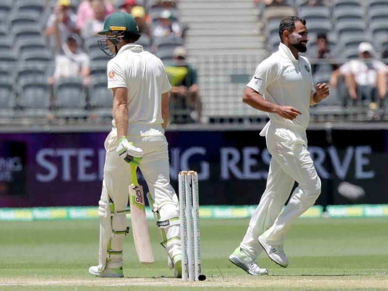 India's Mohammed Shami (R) has taken a career-best 6-56 against Australia in the 2nd Test in Perth.