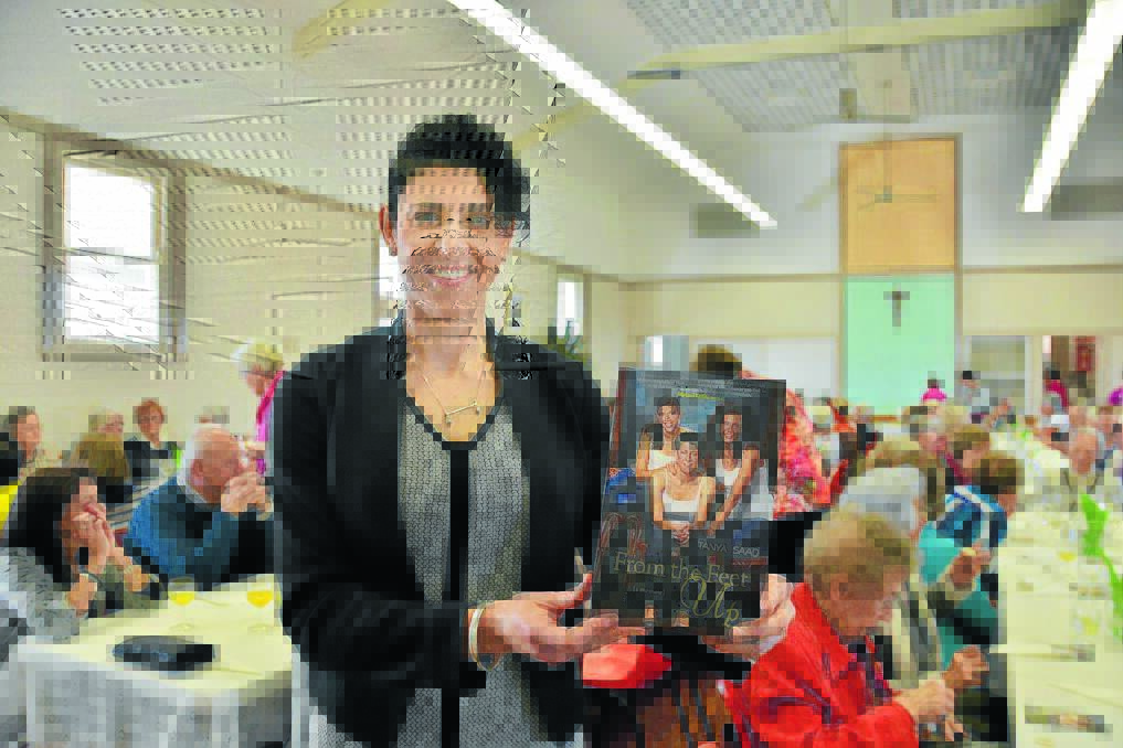Tanya Saad, with her book "From the Feet Up", is pictured at the Quota lunch during the Manning Winter Festival. Tanya was the festival's ambassador.