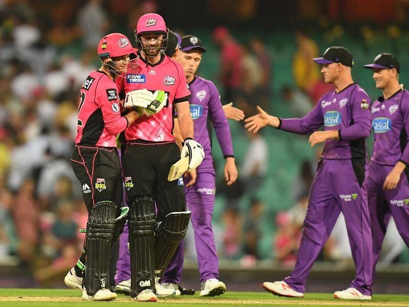 Josh Philippe (l) and James Vince eased Sydney Sixers to a surprise BBL win over Hobart Hurricanes.