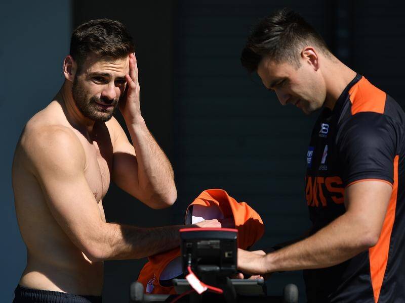 GWS are hoping injured midfielder Stephen Coniglio (L) will return to face the Bulldogs.