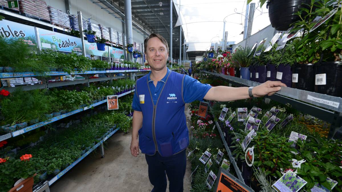 Taree's Masters store manager, Michael Kuchel in the gardening section of the new store.