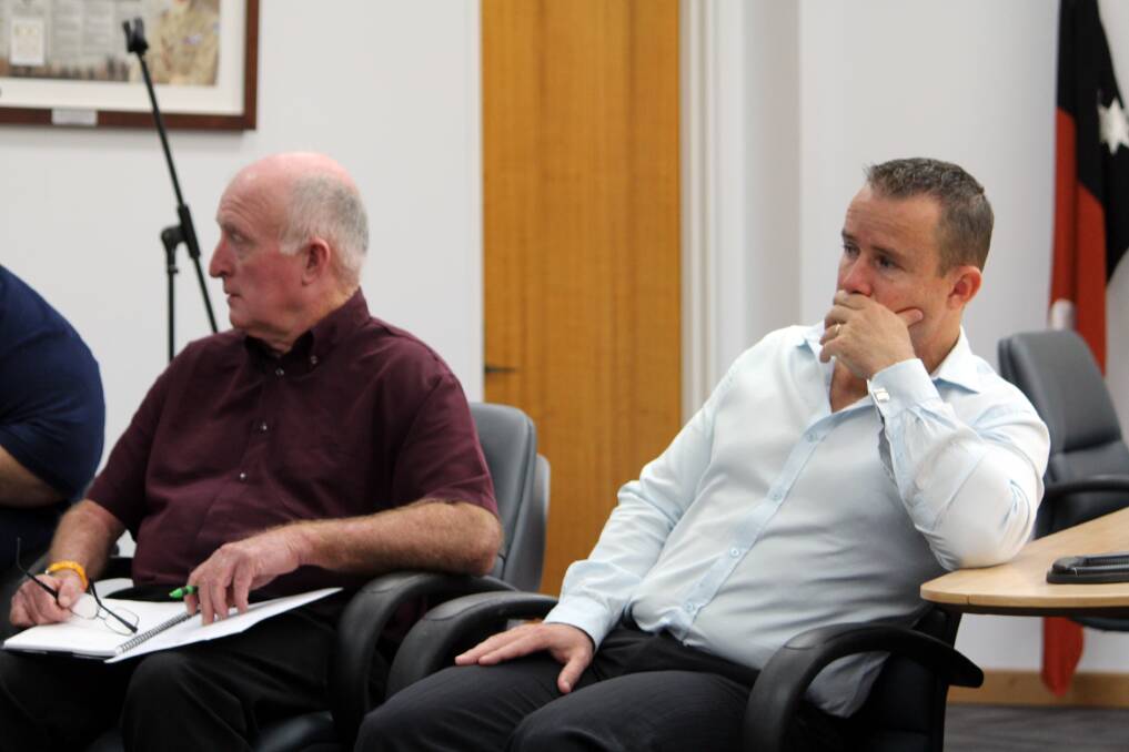 COMMUNITY CONCERN: Northern Territory government select committee member Gerry Wood and chair Nathan Barrett listen to community testimony at a hearing into ice usage in Katherine on Tuesday.