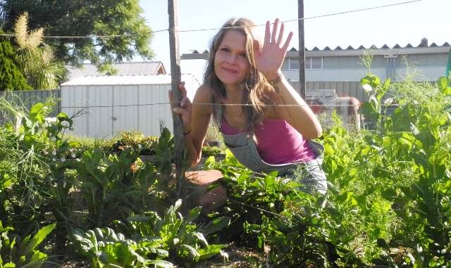 Flourishing with life: Manning Valley Community Gardens volunteer co-ordinator Chelsea Hands plans to make the gardens a vibrant community space. Picture: Julia Driscoll