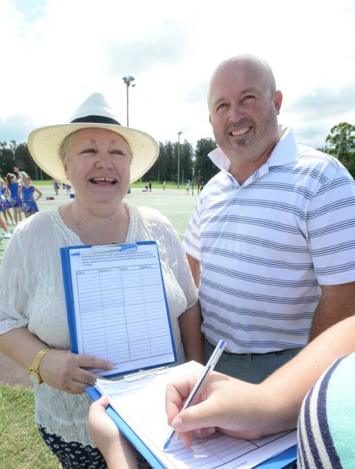 At Taree Recreation Centre: Greater Taree City Council deputy mayor Robyn Jenkins and councillor Brad Christensen took the petition to the people on Saturday.