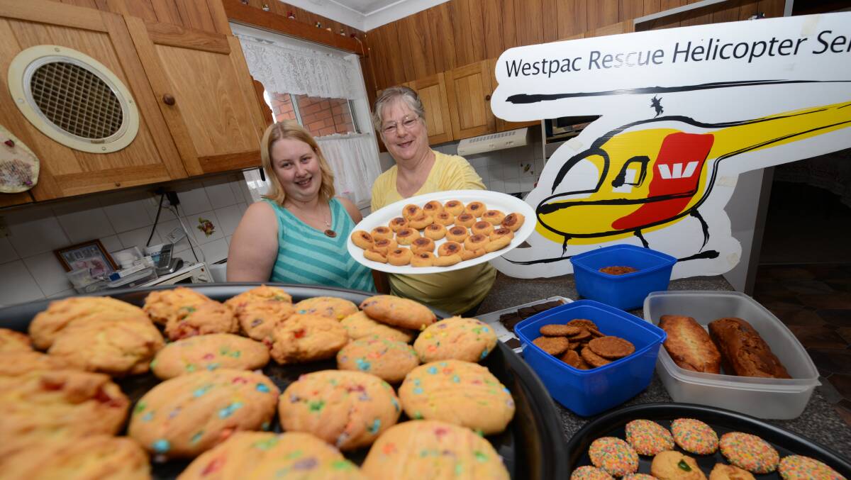 Countless cookies and cakes have been cooked by Betty Mayers for aircrew of the Westpac Rescue Helicopter Service. Granddaughter Kiaharine supports Betty in the kitchen and with fundraising.