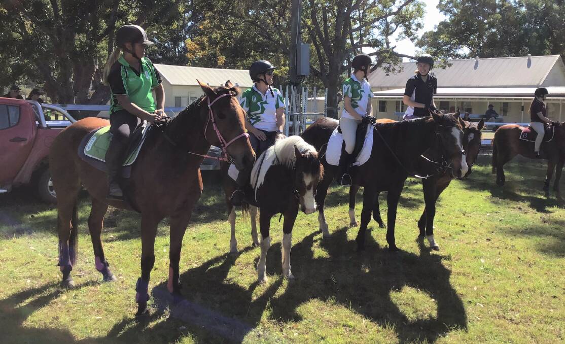 Riders line up at the first Oxley Island Pony Club training day in more than one year. 