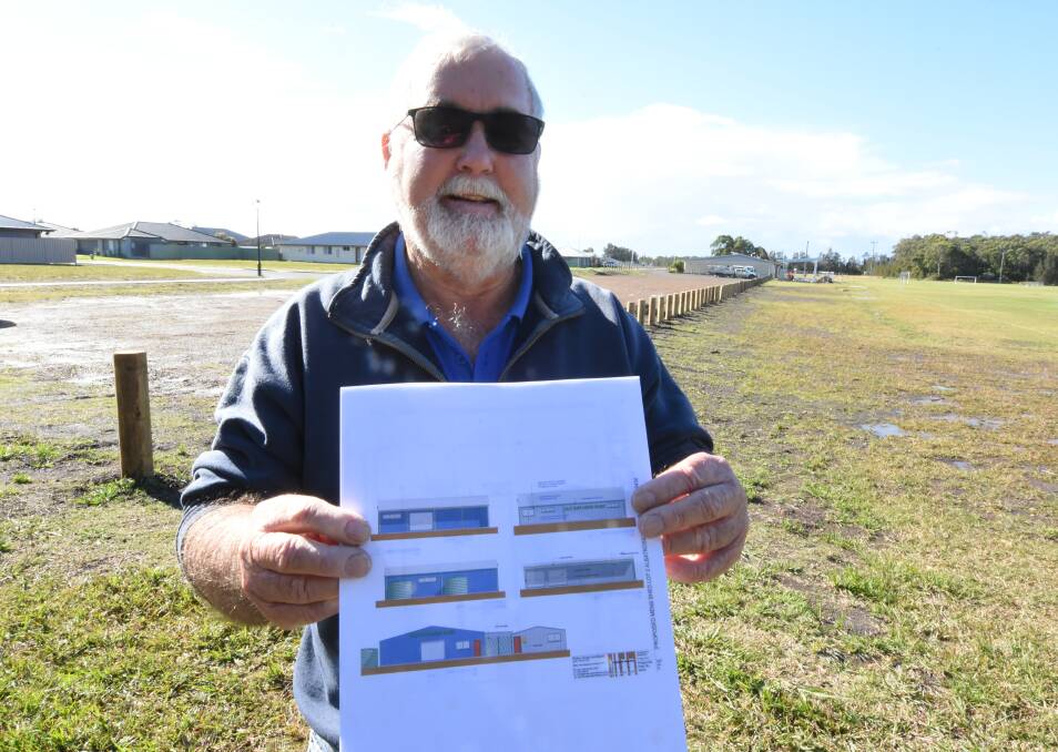Old Bar Men's Shed president David Denning with the plans for the new site.