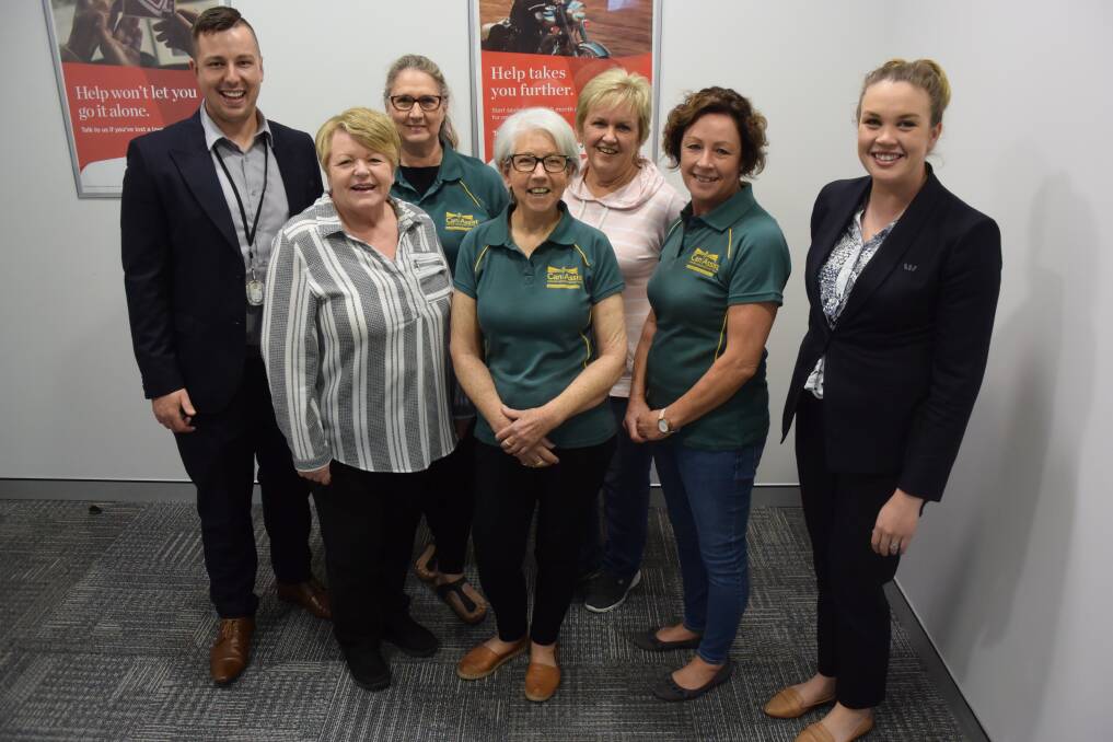 Westpac Taree bank manager Joel Elbourne, Anne-Louise Jones, Sharon Smith, Bonita Lindfield, Barbara Hayes, Robyn Norris and Westpac's Alana Dunn.