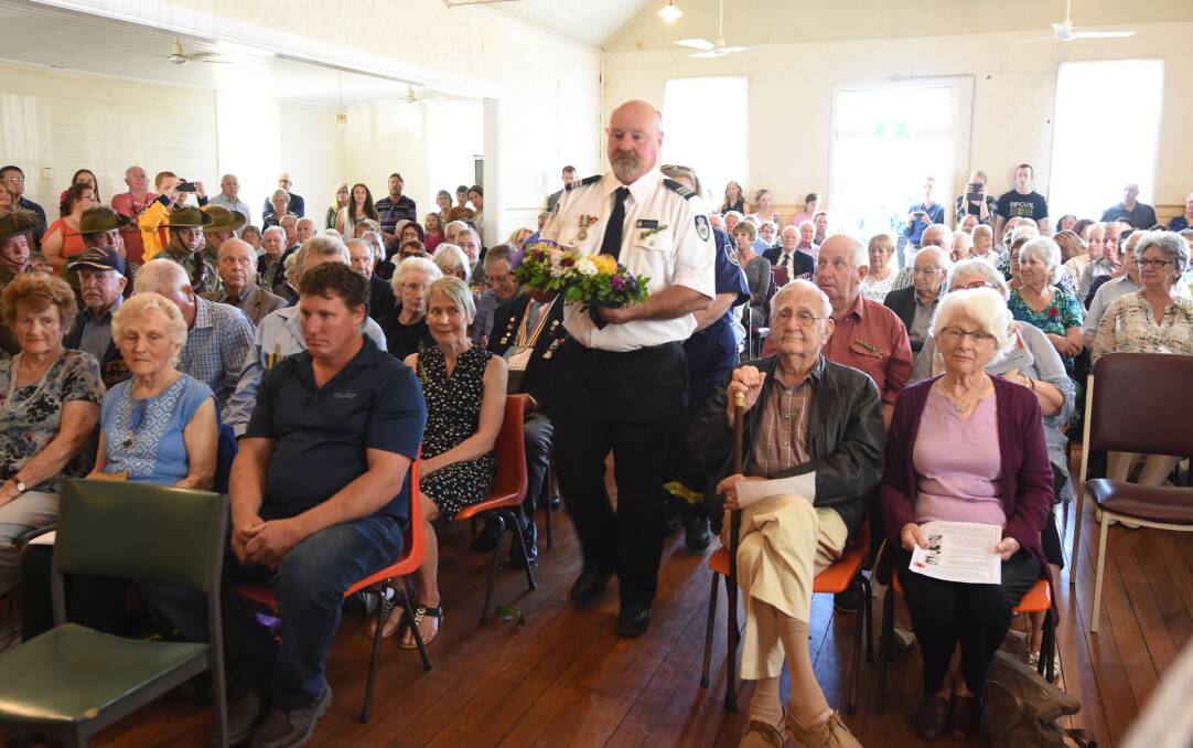 About 150 people turned out for the service at Oxley Island Hall. Photo: Scott Calvin.