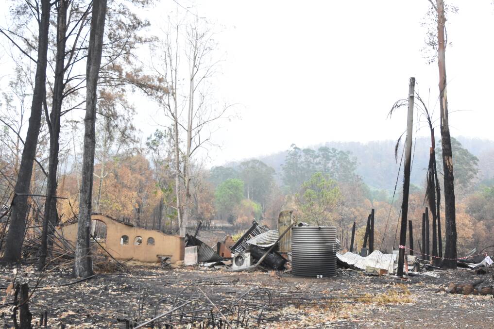 Devastation: The clean-up following the bush fire crisis in the Mid Coast area has begun. For residents in towns such as Bobin, there is a long road ahead. Photo: Scott Calvin.