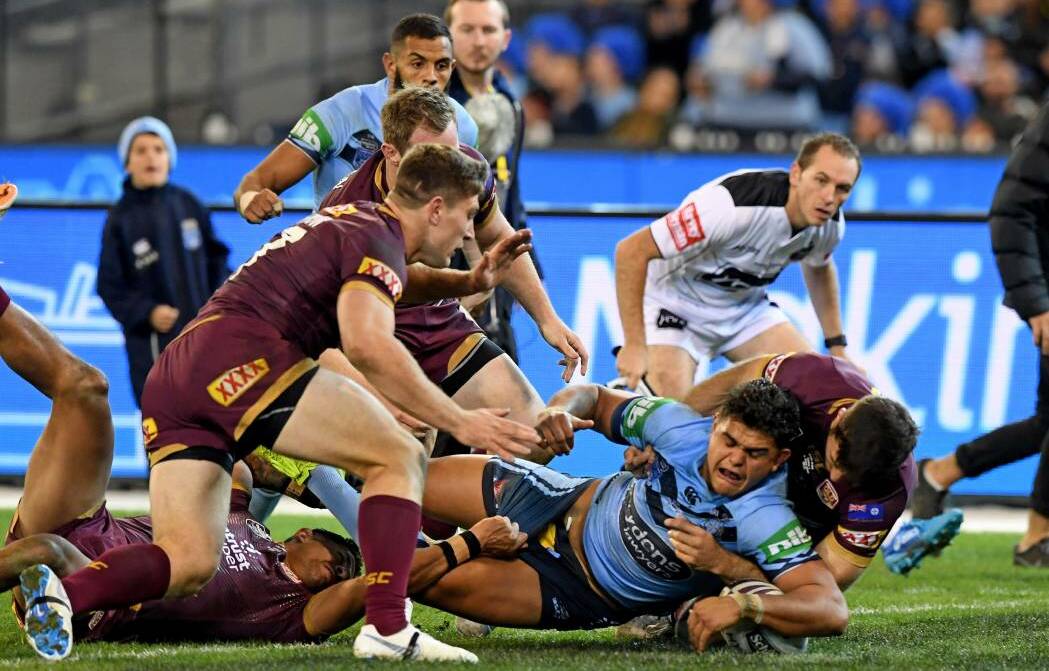 Latrell Mitchell scores a try for NSW. Photo: AAP.