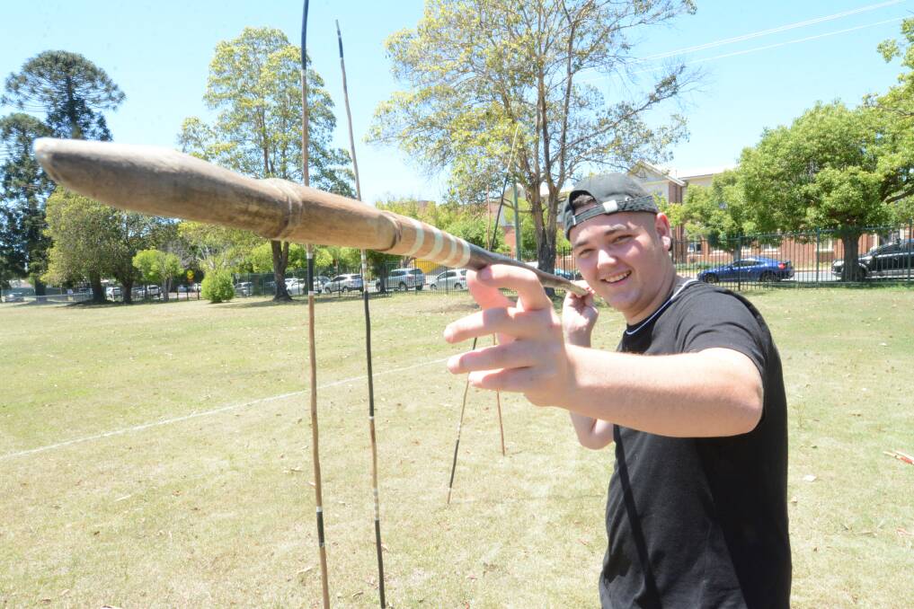 Taree High School's Ethan Long held a spear throwing demonstration with Jay Davis at Johnny Martin Oval. Photo: Scott Calvin. 