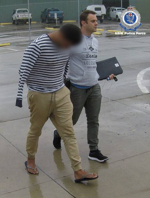 In custody: A 19-year-old man was arrested in relation to an alleged series of armed robberies in 2018. Photo: NSW Police Force. 