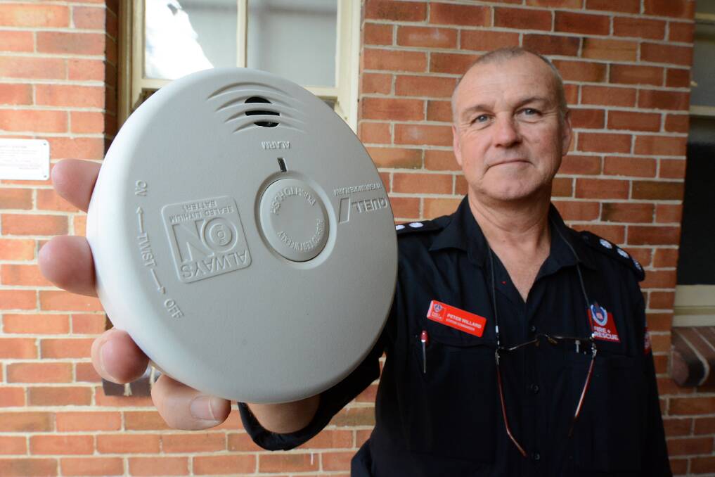 Number one priority: Taree Fire Station Commander Peter Willard wants all home owners to make sure smoke alarms are working. Photo: Scott Calvin.