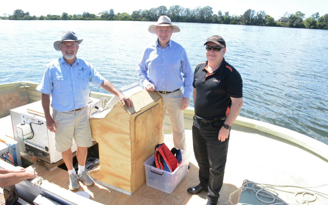 Steber International general manager Alan Steber, Member for Myall Lakes Stephen Bromhead and Ampcontrol CEO/MD Rod Henderson aboard the test rig. Photo: Rob Douglas.