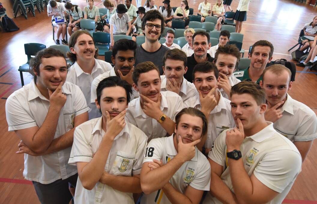 The St Clare's Mo Grow team got one last look at their moustaches before the 'mo-off'. Photo: Scott Calvin. 