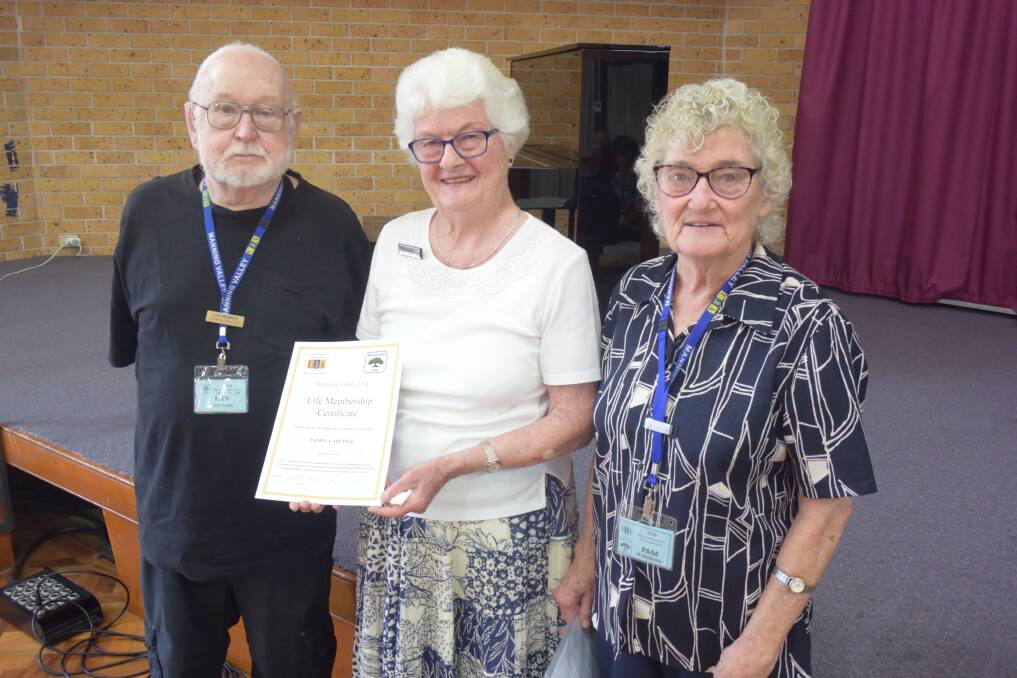 Pam Archer (centre) was presented her U3A life membership by Ern and Pam Hollebone at a branch meeting on Monday.
