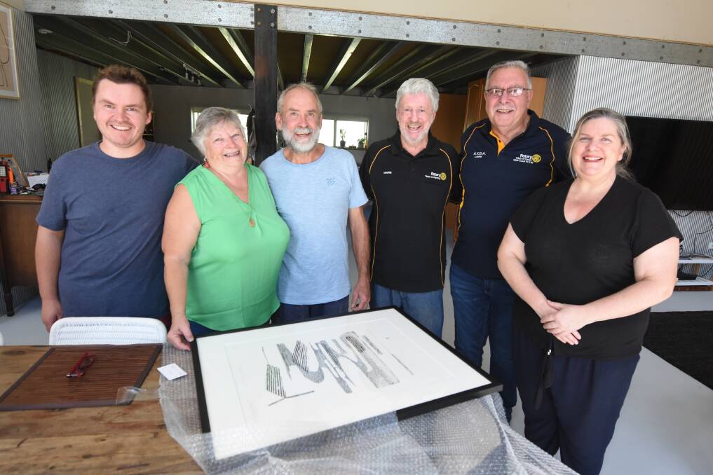 A piece of home: Strathmore, Rosemary and Peter Ruprecht were presented with the donated painting by Rotary Mid Coast bushfire relief committee members Maurie Stack, Laurie Easter and Julie-Ann Booth. Photo: Scott Calvin.