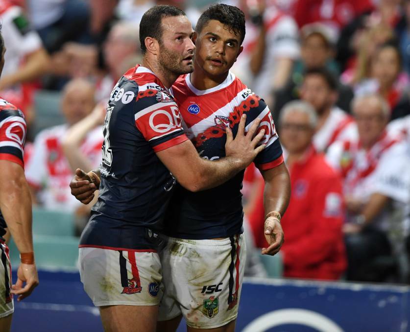 Boyd and Latrell during a match for the Roosters. The duo played for Australia last Saturday.