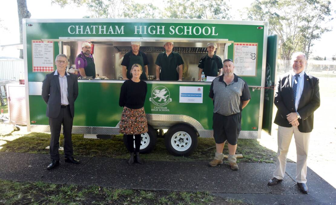 Kitchen on wheels: Chatham High School principal Daryl Irvine, deputy principal Darren Williams, John Thomson, community liaison officer Jodie Bird, students Dylan Bain and Evan Wagener, P and C president Dale Patterson and Member for Myall Lakes Stephen Bromhead with the new food van. Photo: Rob Douglas.