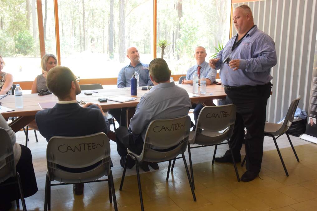 Machine Shop and Engineering Services' Bob McCrimmon during discussions last month.