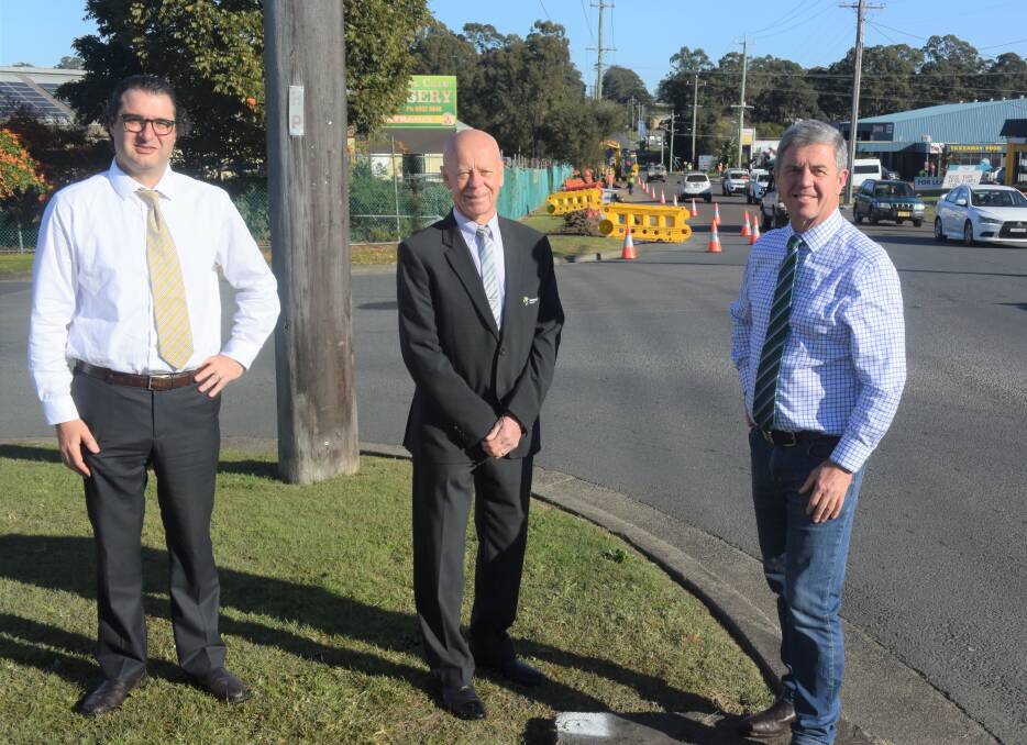 MidCoast Council general manager Adrian Panuccio, mayor David West and Member for Lyne Dr David Gillespie with ongoing roadworks on Muldoon Street behind them. Federal funding has been allocated to repair another section of the street. Photo: Rob Douglas.