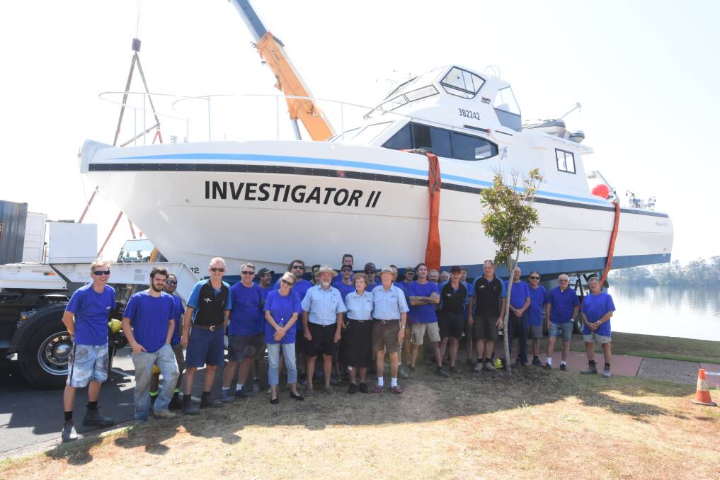 Mission accomplished: Steber International staff with Investigator II before its voyage to Mauritius. Photo: Scott Calvin.