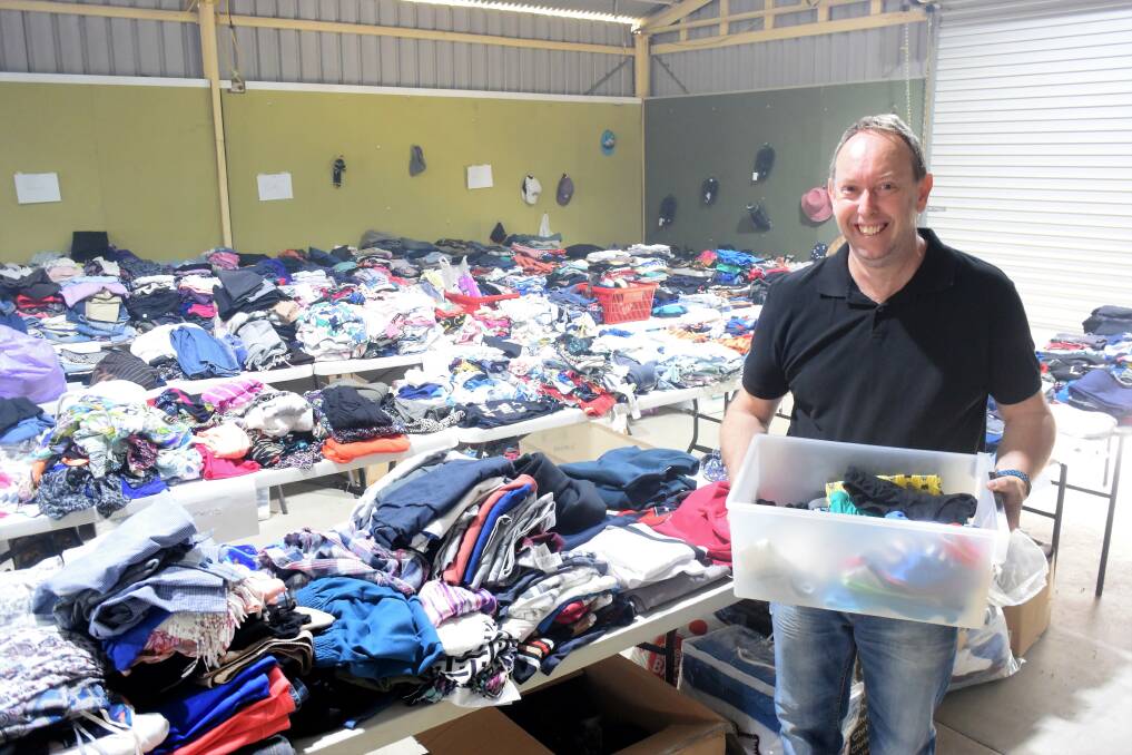 Donations coordinator Damien Watters at the relief centre at Taree Showground. There have been hundreds of donations pouring in from the public. Photo: Rob Douglas.