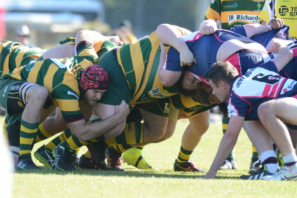 Crouch, bind, set: The Dolphins and Manning River Ratz pack a scrum during the 2019 grand final.