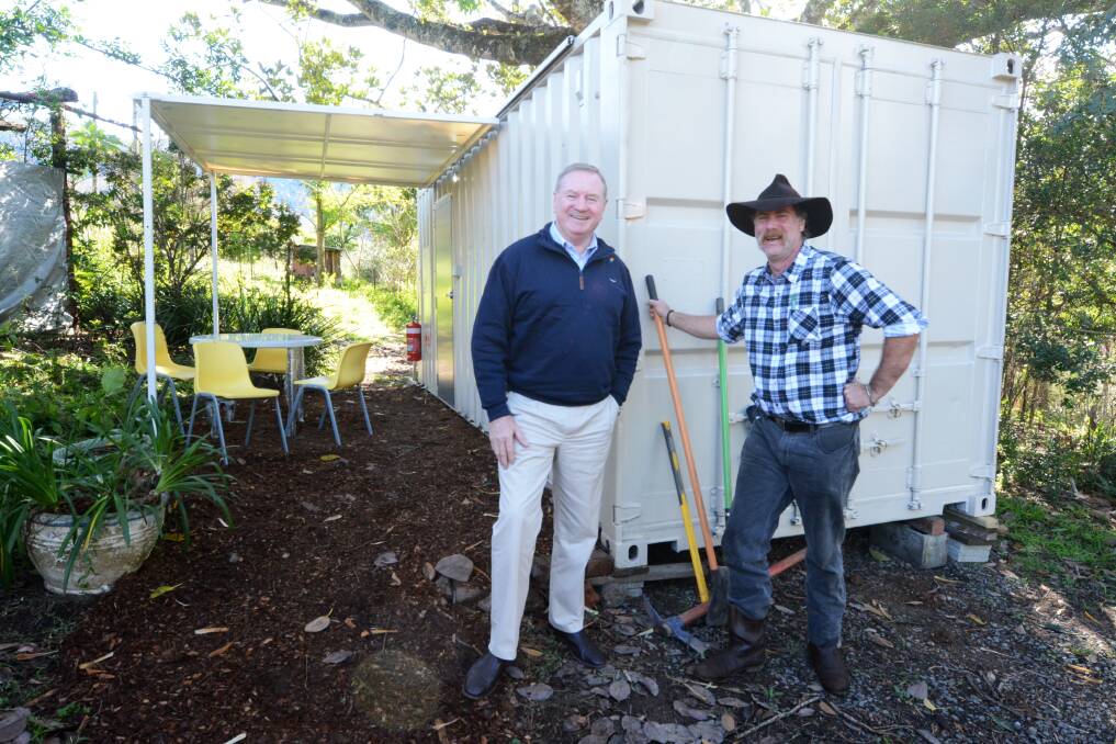 A temporary home: Member for Myall Lakes Stephen Bromhead and Bobin resident Paul Miscamble are thrilled with the roll out of housing pods. Photo: Scott Calvin.