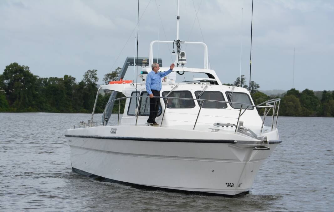 Launch: Steber International's Alan Steber aboard the Steber 40 on the Manning River. Photo: Scott Calvin.
