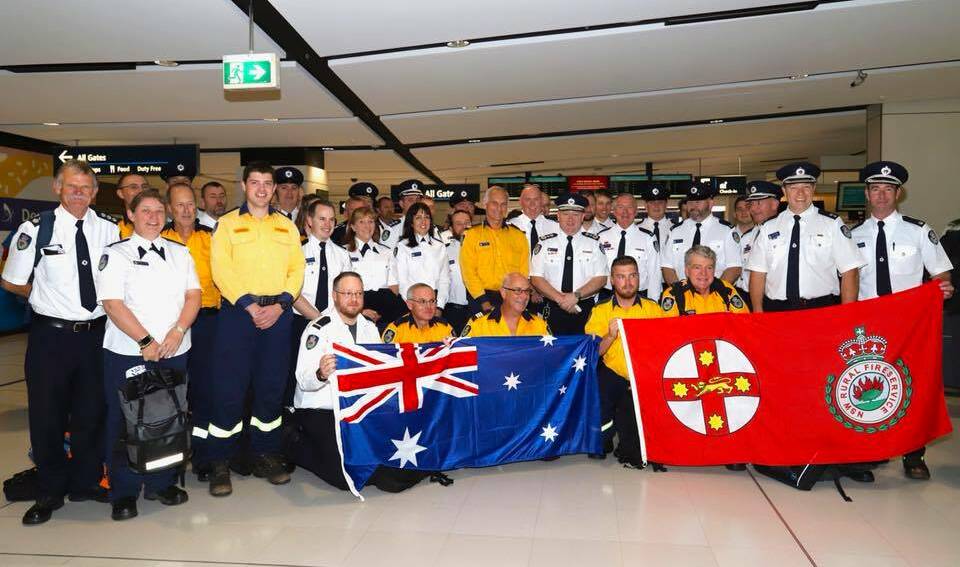 Ready for action: The Australian contingent of Rural Fire Service personnel before their flight to the US to battle bushfires. Photo: Rural Fire Service.